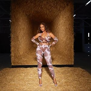 IVY PARK Cow-print tights